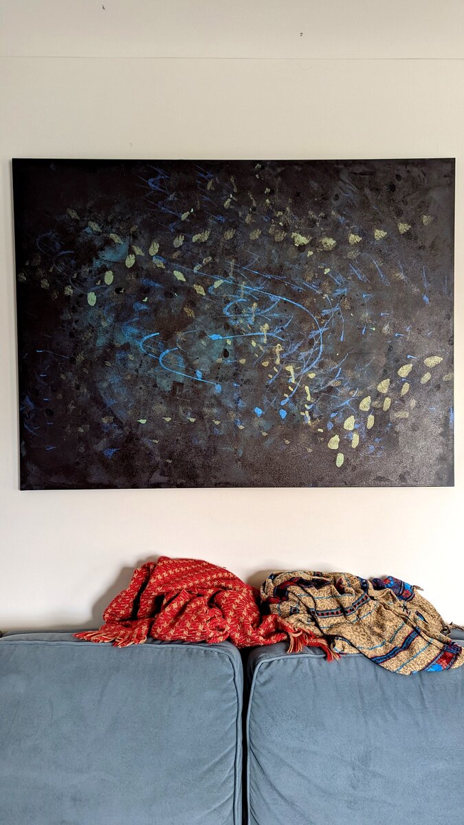 Large abstract painting installed in living room